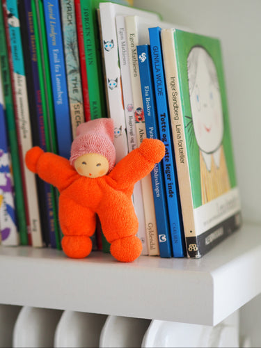Wichtel Rattle Doll Red Orange